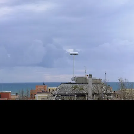 Апартаменты Attico Al Mare Лидо-ди-Остия